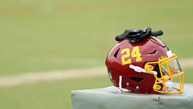 Antonio Gibson Helmet & Glove